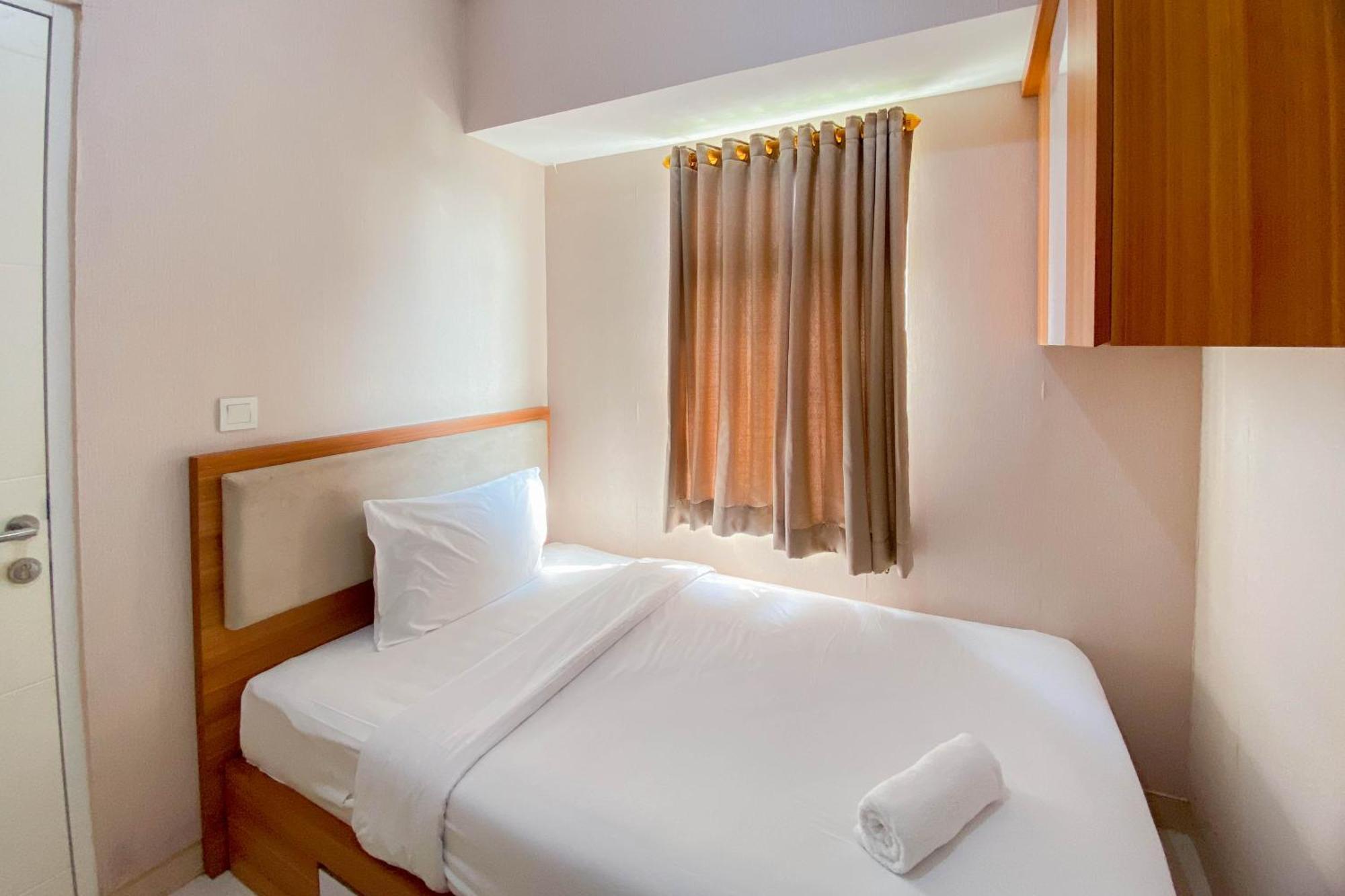 Restful And Tidy 2br Springlake Summarecon By Travelio * Bekasi